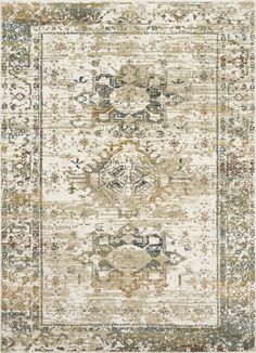 an area rug with various colors and patterns on the floor, including beiges, browns,