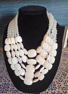 Amazing white statement necklace in excellent condition! Vintage White Necklace For Party, White Long Beaded Necklace For Party, White Costume Jewelry Beaded Necklaces For Party, White Long Necklace For Party, White Long Beaded Necklaces For Party, White Long Necklace In Costume Jewelry Style, Elegant White Necklace, White Beaded Necklace For Formal Costume Jewelry, White Vintage Party Necklace