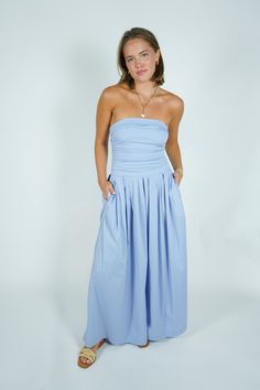 Get ready to slay in the Bella Jumpsuit! This strapless ruched top and wide leg combo is perfect for any occasion! Look effortlessly chic while showing off your curves. No more struggling to find the perfect outfit, this jumpsuit has got you covered! Size + Fit Kate is 5'8" and wearing a size Small Content + Care 65% Cotton 32% Nylon 3% Spandex Lining: 97% Polyester 3% Spandex Hand Wash Cold Color Separate Sneaker Heels Wedges, Ruched Top, Outerwear Vest, Crop Top Sweater, Vacation Dresses, Little White Dresses, Active Wear Outfits, Country Chic, Matching Dresses