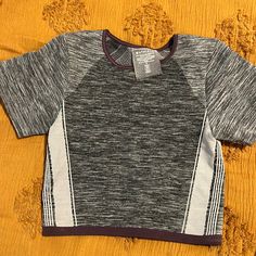 Convinced Myself That I’d Have The Abs To Wear This One Day Lol- It’s A Great Stretchy Material! Never Worn- Just Tried On! Gray Short Sleeve Tops For Light Exercise, Purple Stretch Crop Top With Short Sleeves, Purple Go-dry Athleisure Top, Casual Gray Crop Top For Sports, Gray Casual Top For Light Exercise, Casual Gray Top For Light Exercise, Purple Short Sleeve Activewear For Workout, Purple Sportswear Top For Workout, Purple Athleisure Tops For Sports