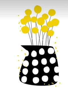 a polka dot vase with yellow flowers in it