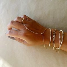 Hand Bracelet | Post 21 Ring Chain Bracelet, Bracelet Wrist, Hand Bracelet, Jewelry Lookbook, Minimalist Bracelet, Jewelry Inspo, Chain Ring, Gold Filled Chain, Ring Jewelry