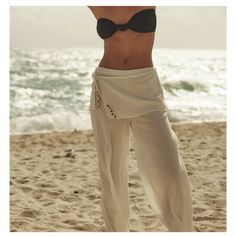 **New** $70 Free People Pasadena Pants! So Breezy And Just As Effortless, Beachy Pants From Our Free-Est Collection Are The Perfect Elevated Staple. Easily Thrown Over Your Swimwear Or Cozied-Up With An Oversized Sweater, You’ll Be Reaching For These From This Season To The Next. Features: - Size: Various - Color: Ivory - Fit: Low-Slung, Loose Wide-Leg Silhouette - Pull-On Design - Panel Overlay At The Waist - Beaded Tie Closure - Semi-Sheer Woven Fabrication - 100% Cotton Measurements For A Siz White Tie-side Bottoms For Beach Season, Chic White Wide Leg Pants For Vacation, Elegant High Waist Wide Leg Beach Pants, White Tie-side Bottom Pants For Spring, Elegant White Wide Leg Pants For Vacation, White Wide Leg Pants For Beach Season, White Fitted Pants For Beach Season, Elegant Summer Wide Leg Beach Pants, White Wide Leg Beach Pants