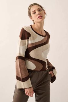 Abstract stripe-pattern knit sweater.Round neckline.Rolled collar.Long bell sleeves.Natural waist length.Relaxed fit.64% Acrylic, 26% Polyester, 10% Nylon.Imported. Designed in LA.Model wears size S. Rolled Collar, Bell Sleeve Sweater, Pattern Sweater, Brown Sweater, New Wave, Flared Sleeves, S Models, Sleeve Sweater, Stripes Pattern