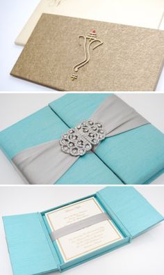 the wedding card is made out of blue and silver paper with a ribbon on it