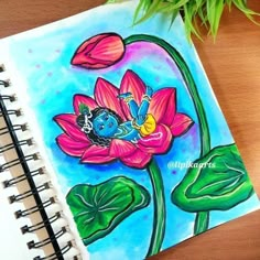 a drawing of a flower with an image of a god on it