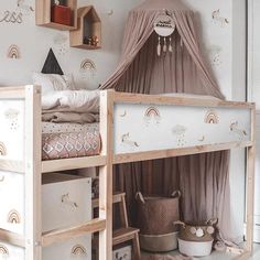 a child's bedroom with bunk beds and curtains