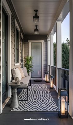 the front porch is decorated with candles and lanterns