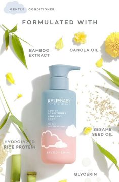 a bottle of kyllebaby hand and body lotion on a white background surrounded by flowers