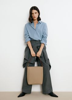 The Carrie Medium Tote Bag's rectangular silhouette sits perfectly on the shoulder, with a wide leather strap that is adjustable with the belt loop detail. Lined with smooth leather, the bag can fit an 13" laptop, making it an ideal everyday tote. Optional Add-ons: Webbing Shoulder Strap; AirPods Pro Case. Medium Tote Bag, Everyday Tote, Medium Tote, New Green, Add Ons, Airpods Pro, Smooth Leather, Carry On, Leather Straps