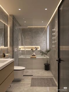 a bathroom with a toilet, sink and bathtub next to a mirror on the wall