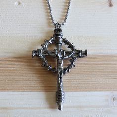 "We thank you for looking at our store. We have many unique religious pendant necklaces, using chains, and High-quality Pendants. We are sure you will find the perfect one for you, and you'll love it. A pendant reminds us of the sacrifice and love of God for us, and it deserves to represent the beauty of this fact. Our pendant necklaces are unique and all handmade with love. - Beautiful and Unique design  - Excellent reminder for daily prayer - Chain, stainless steel, 2.4mm ball, 20 inches with clasp - High quality 2.3\" Crown and Nails Crucifix - Handmade by us (Catholic Mercy) in Oklahoma, USA If you have any questions or issues please don't hesitate to contact us, so we can make it right! We will respond within 24 hours.  God Bless you! For the word of the cross is folly to those who ar Spiritual Metal Cross Necklaces, Metal Crucifix Cross Necklace As Gift, Metal Crucifix Cross Necklace Gift, Metal Crucifix Cross Necklace For Gift, Symbolic Metal Cross Necklace, Spiritual Metal Cross Necklace, Metal Cross Charm Necklace, Metal Crucifix Necklace With Adjustable Chain, Spiritual Metal Cross Pendant Necklace