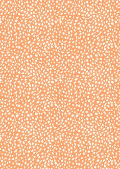 an orange and white background with small dots