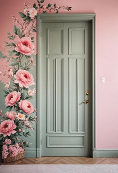 an open door with pink flowers painted on the wall next to it and a basket full of flowers