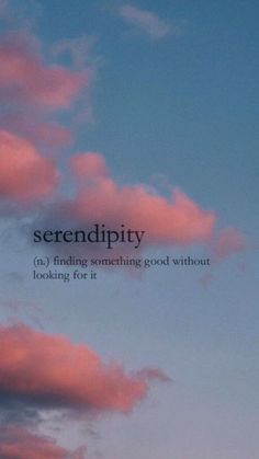 the words serendipity are written in black on a pink sky with clouds