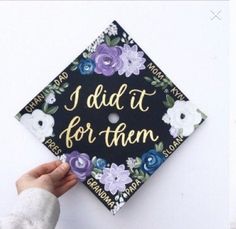 someone is holding up a graduation cap that says i did it for them