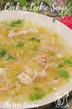 a white bowl filled with soup on top of a table