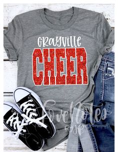 Casual Glitter Print Tops For Cheerleading, Short Sleeve Top With Glitter Print For Cheerleading, Short Sleeve Glitter Print Top For Cheerleading, School Spirit Glitter Print Short Sleeve Top, School Spirit Short Sleeve Top With Glitter Print, Short Sleeve Tops With Glitter Print For School Spirit, School Spirit Tops With Glitter Print For Cheerleading, Cotton Cheerleading Top With Glitter Print, Cotton Tops With Glitter Print For School Spirit