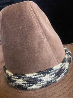 Lovely Stetson cowboy hat with woven band around the crown. Material feels like a short velour fabric. Great second hand condition Labeled as a size 6 3/4 - 6 7/8 Measures about 21.5 inches in circumference Brown Hat Bands For Winter, One Size Fits Most, Rustic Brimmed Fedora For Winter, Rustic Winter Hats For Ranch, Rustic Fedora For Winter Country Events, Rustic Winter Ranch Hats, Brown Winter Hat For Rodeo, Brown Winter Rodeo Hats, Vintage Fedora For Winter Ranch, Vintage Winter Fedora For Ranch