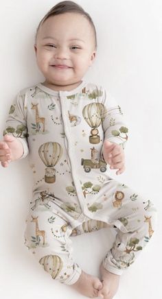 Enchanting Organic Bodysuits: Snap Front Comfort Delight in the charm of our Organic Cotton Bodysuits, available in 'Unicorn Land', 'Sleepy Time Animals', 'Ellie + Croc', and 'Zootopia' prints. These cozy, long-sleeved snap-front bodysuits are spun from the softest organic cotton for ultimate comfort. Easy to wear and change, they're perfect for your little one's day-to-day adventures. Organic Baby Clothes, Cute Infant Wear, Snap Bodysuits Why You'll Love It: Storybook-inspired prints to spark i Playful Long Sleeve Fitted Jumpsuits And Rompers, Playful Fitted Long Sleeve Jumpsuits And Rompers, Playful Fitted Jumpsuits And Rompers For Loungewear, White Long Sleeve Bodysuit For Sleep, White Long Sleeve Jumpsuits And Rompers With Cartoon Print, White Long Sleeve Jumpsuit With Cartoon Print, Playful Long Sleeve Bodysuit For Bedtime, Printed Long Sleeve Onesie For Bedtime, Printed Long Sleeve Onesie For Sleep