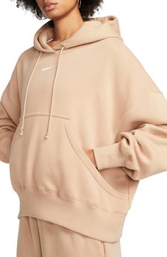 Supersoft fleece means all-day comfort in a dropped-shoulder hoodie perfect for relaxing at home or heading to the gym. Drawstring hood 80% cotton, 20% polyester Machine wash, line dry Imported