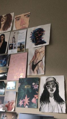 the wall is covered with pictures and posters