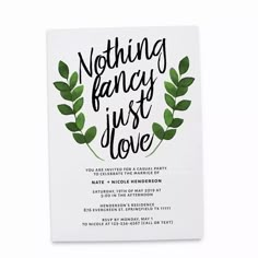 a white card with green leaves and the words nothing fancy just love written on it