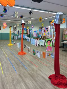 an empty classroom with decorations on the floor