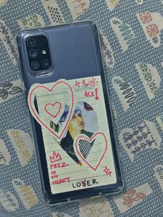 a cell phone case with an image of a woman's face and hearts on it