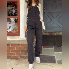 Elevate Your Fashion Game With Our "Black Denim Chic Jumpsuit." This Women's Straight-Leg Overall Exudes Style And Versatility. Crafted From High-Quality Denim, It Offers Both Comfort And Durability. The Chic Design Effortlessly Combines A Classic Black Hue With Modern Aesthetics. Whether You're Out For A Casual Day Or A Night On The Town, This Jumpsuit Is Your Go-To Choice For A Sleek And Fashionable Look. Embrace Confidence And Sophistication With This Wardrobe Essential. Casual Black Straight Leg Overalls, Black Casual Overalls, Black Non-stretch Overalls With Pockets, Black High-waisted Denim Jumpsuit With Pockets, Black High Waist Casual Denim Jumpsuit, Trendy Black Denim Jumpsuits And Rompers, Black High-waist Denim Jumpsuit Casual, Casual Black High-waist Denim Jumpsuit, Black High-waisted Denim Overalls