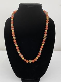 Handmade coral agate necklace with gold accent. Easy on and off magnetic clasp. Gold Single Strand Agate Necklace, Gold Agate Single Strand Beaded Necklace, Gold Necklace With Large Red Coral Beads, Gold Hand-strung Agate Necklace, Great Falls, Agate Necklace, Gold Accent, Magnetic Clasp, Gold Accents