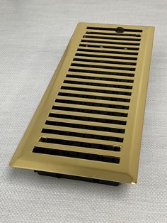 Decorative Polished Brass Metal Register - Contemporary Brass Vent Cover. Designer decorative air grille featuring a simple drop-in installation process. Our polished brass vent covers are crafted with a steel damper which allows for heating and cooling airflow control. The decorative air grille is also made with a 3mm thick faceplate, which is durable. The polished brass vent cover is crafted with a lacquered finish to help prevent wear and tear on the decorative air grilles faceplate. These de Brass Vent Covers, Vent Covers, Knobs And Handles, Wire Mesh, Brass Metal, Heating And Cooling, Polished Brass, Ceiling, Plating