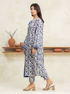 Brand: edenrobe Product: EWU24A1-29031-3PCollection: Allure Lawn Unstitched - Spring Summer CollectionFabric: Lawn DESIGN DETAILS: 3M Printed Lawn Shirt 2.5M Printed Lawn Dupatta 1.8M Dyed Trouser DISCLAIMER:* Lining, Laces, and Tassels are not included in unstitched variants.* Embellishment items in stitched outfits are subject to market availability.* The actual colors of the outfit may vary from the colors being displayed on your device. CARE INSTRUCTIONS: Extra Fabric Has Been Used For Shoot Original Color May Vary Slightly From The Picture Dry Clean Recommended Iron The Clothes At Moderate Temperature Do Not Use Bleach, Or Stain Removing Chemicals Damp Fabric Should Not Be Exposed To Sunlight edenrobe Allure Lawn Spring Summer Collection Authenticity Guaranteed – 100% Original Brand 3 Fitted Elegant Floral Print Traditional Wear, Elegant Fitted Traditional Wear With Floral Print, Elegant Fitted Salwar Kameez With Printed Motifs, Elegant Fitted Palazzo Set With Floral Print, Elegant Floral Print Festive Pant Set, Elegant Fitted Lawn Suit With Printed Motifs, Elegant Fitted Kurta With Printed Motifs, Elegant White Unstitched Suit With Floral Print, Elegant Sets With Straight Kurta And Printed Motifs