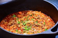 a large pot filled with food on top of a stove