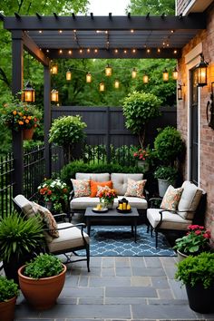 an outdoor patio with seating and potted plants