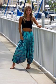 Boho flowy pants you've been searching for. Easy ear design, perfect as lounge pants, festival boho pants, yoga pants. These harem pants have a side pocket.  + Flowy design + One size + Side pocket + Tie dye  * leg length 36" * leg cuff 6" diameter  * waist stretches 22-28"( 11"-14" laying flat) Flowy Boho Pants, Ear Design, Festival Pants, Waist Stretches, Flowy Design, Boho Pants, Flowy Pants, Leg Cuffs, Fall Fits