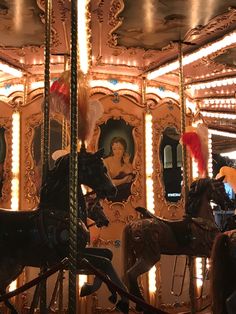 an old fashioned merry go round with horses