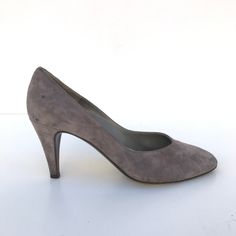 "Vintage Bruno Magli Grey Suede Leather Pumps Almond Toe 7 Heels heel height: 3\" details: classic design, grey interior flaws: very minor wear marked size: 7B made in Italy Excellent Vintage Condition" Classic Heels With Suede Lining For Office, Classic Closed Toe Suede Heels, Classic Suede Closed Toe Heels, Classic Closed Toe Heels With Suede Lining, Classic Suede Heels, Gray Heels For Formal Occasions, Classic Medium Width Suede Heels, Formal Heels With Suede Lining And Almond Toe, Formal Heels With Suede Lining And Round Toe