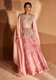 Bhumika Sharma-Blush Bahaar Lehenga And Cape Set-INDIASPOPUP.COM Aneesh Agarwaal, Bhumika Sharma, Organza Cape, Cape Lehenga, Embroidered Bustier, Cape Set, Printed Lehenga, Navratri Dress, Pink Cape