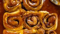 several cinnamon rolls sitting on top of a table