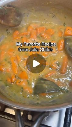 a pot filled with soup and spoons on top of a burner oven, next to the words my favorite recipe from julia child's