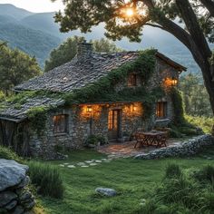 an old stone house with grass growing on it's roof, surrounded by rocks and trees