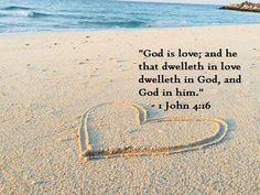 a heart drawn in the sand with john 4 16