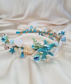 This elegant hair piece made with seashell, starfish, pearls and crystals. These kinds of hairbands are loose enough not to give headaches (for those sensitive to that) but still stay in place! This headband is perfect for bride, bridesmaid, and flower girl. A great nautical wedding mermaid headpiece for your beach, boat or destination wedding. Also a nice festive hair vine for any kind of celebrations, boat, beach parties and any special days for you to shine. Or It can be a beautiful present S Shell Headpiece, Seashell Tiara, Mermaid Makeup Halloween, Mermaid Headpiece, Beach Wedding Hair Accessories, Beach Hair Accessories, Wedding Mermaid, Floral Dress Wedding Guest, Festive Hair