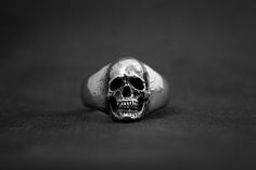 Classic Infinity Ring Symbolic Engraved Skull Ring, Classic Sterling Silver Skull Jewelry, Classic Engraved Skull Jewelry, Classic Polished Skull Ring Collectible, Sterling Silver Skull Ring Engraved, Sterling Silver Skull Ring With Engraving, Sterling Silver Engraved Skull Ring, Classic Engraved Sterling Silver Skull Ring, Classic Skull Ring As Gift