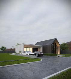 two cars are parked in front of a modern house with a driveway and parking lot