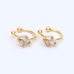 ★ High quality real gold plated brass earring clips, color not easily tarnish, lead nickel free ★ Size: 13x12mm approx. Quantity: 10pcs=5 pairs Color: gold Material: gold plated brass See the last picture, we have rubber covers that match this earring and comfort ears: https://www.etsy.com/listing/691605326/20pcs-rubber-covers-for-clip-on-earrings ❤ More gold plated brass items here: ❤ https://www.etsy.com/shop/Nbeads?search_query=GB ❤ More metal findings(brass, silver, alloy etc.) here: ❤ https Adjustable Gold Clip-on Cartilage Earrings, Adjustable Gold Clip-on Ear Cuff, Adjustable Gold Plated Ear Cuff, Adjustable Gold Open Ring Cartilage Earrings, Adjustable Gold Huggie Ear Cuff, Pave Ear Cuff, Gold Flakes, Brass Earrings, Gold Hoops