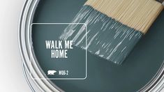 a paint can with a brush in it and the words walk me home painted on it