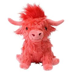 a red stuffed animal with long hair on it's face and eyes, sitting in front of a white background