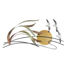 three metal birds flying over grass on a white background with the sun in the distance